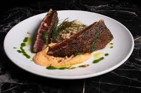 Giancarlo's Sicilian Steakhouse signature dishes Sicilian TenderloinAranciniGiancarlo’s Lasagna